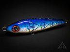 Blue and white fishing lure with a dark background