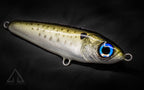Hand Poured Resin Fishing lure with detailed design on a dark background 