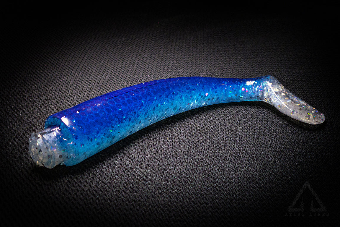 Blue fishing lure with a dark background
